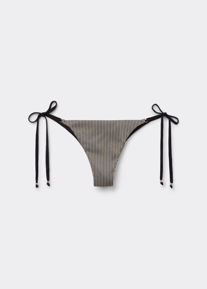 Brasilianska bikinitrosor med guldiga ränder Brasilianska bikinitrosor med guldiga ränder