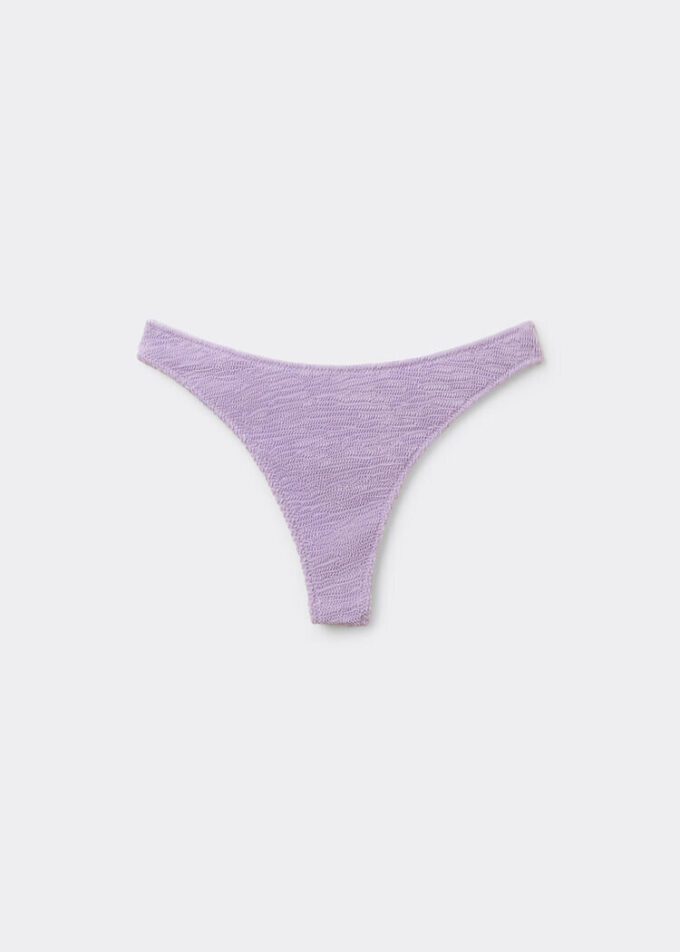 Brasilianska bikinitrosor med krusade vågor Brasilianska bikinitrosor med krusade vågor