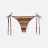 Guldfärgade brasilianska bikinitrosor med chevronmönster Guldfärgade brasilianska bikinitrosor med chevronmönster